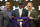 Baltimore Ravens NFL football first round draft pick Marquise Brown, center, stands with head coach John Harbaugh, left, and Executive Vice President/General Manager Eric DeCosta Friday, April 26, 2019, in Owings Mills, Md. (AP Photo/Gail Burton)