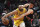 Los Angeles Clippers forward Danilo Gallinari, right, reaches in on Los Angeles Lakers center JaVale McGee during the first half of an NBA basketball game Friday, April 5, 2019, in Los Angeles. (AP Photo/Mark J. Terrill)