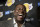 Magic Johnson speaks to reporters prior to an NBA basketball game between the Los Angeles Lakers and the Portland Trail Blazers on Tuesday, April 9, 2019, in Los Angeles. Johnson abruptly quit as the Lakers' president of basketball operations Tuesday night, citing his desire to return to the simpler life he enjoyed as a wealthy businessman and beloved former player before taking charge of the franchise just over two years ago. (AP Photo/Mark J. Terrill)