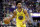 Golden State Warriors guard Quinn Cook plays against the Phoenix Suns during an NBA basketball game in Phoenix, Sunday, March 18, 2018. (AP Photo/Chris Carlson)