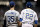 MILWAUKEE, WISCONSIN - APRIL 19:  Cody Bellinger #35 of the Los Angeles Dodgers and Christian Yelich #22 of the Milwaukee Brewers stand at first base in the fifth inning at Miller Park on April 19, 2019 in Milwaukee, Wisconsin. (Photo by Dylan Buell/Getty Images)