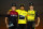 Colombia's Egan Bernal (C) celebrates his overall leader's yellow jersey as he poses with second-placed Great Britain's Geraint Thomas (L) and third-placed Netherlands' Steven Kruijswijk on the podium of the 21st and last stage of the 106th edition of the Tour de France cycling race between Rambouillet and Paris Champs-Elysees, in Paris on July 28, 2019. (Photo by Marco Bertorello / AFP)        (Photo credit should read MARCO BERTORELLO/AFP/Getty Images)