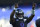 Baltimore Ravens quarterback Lamar Jackson motions to the fans during NFL football training camp Saturday, July 27, 2019, in Baltimore. (AP Photo/Gail Burton)