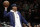 Former NBA player Carmelo Anthony throws the ball back during the second half of an NBA basketball game between the Brooklyn Nets and the Miami Heat, Wednesday, April 10, 2019, in New York. Anthony attended the game to watch the final game of Heat guard Dwyane Wade's NBA career. (AP Photo/Kathy Willens)