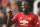 Manchester United's Belgian striker Romelu Lukaku  gestures during the English Premier League football match between Manchester United and Liverpool at Old Trafford in Manchester, north west England, on February 24, 2019. (Photo by Oli SCARFF / AFP) / RESTRICTED TO EDITORIAL USE. No use with unauthorized audio, video, data, fixture lists, club/league logos or 'live' services. Online in-match use limited to 120 images. An additional 40 images may be used in extra time. No video emulation. Social media in-match use limited to 120 images. An additional 40 images may be used in extra time. No use in betting publications, games or single club/league/player publications. /         (Photo credit should read OLI SCARFF/AFP/Getty Images)
