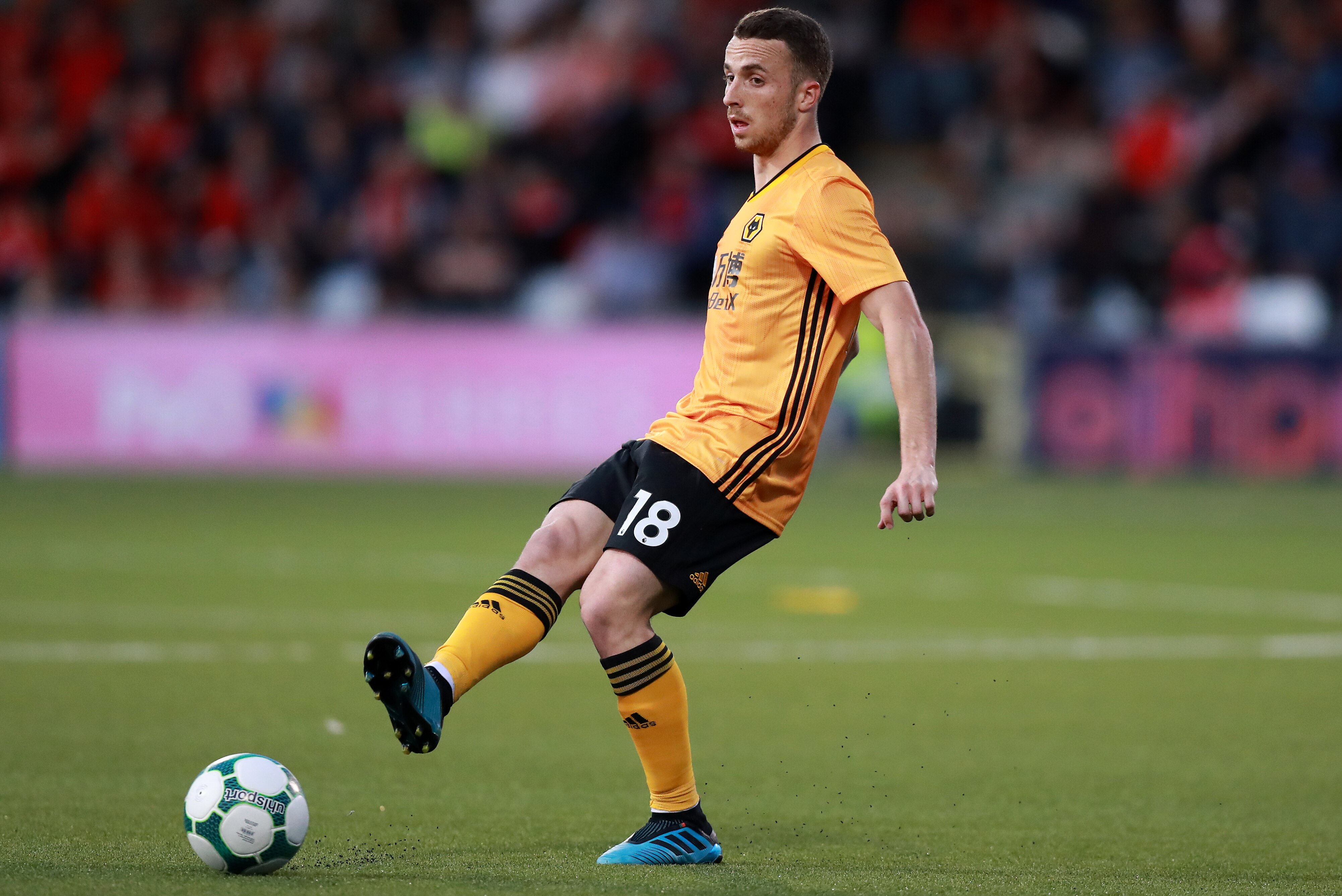 BELFAST, NORTHERN IRELAND - AUGUST 01: Diogo Jota of Wolverhampton Wanderers passes the ball during the UEFA Europa League Second Qualifying round 2nd Leg match between Crusaders and Wolverhampton Wanderers at Seaview Stadium on August 01, 2019 in Belfast, Northern Ireland. (Photo by David Rogers/Getty Images)
