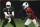 Arizona Cardinals quarterback Kyler Murray (1) hands the ball off to Cardinals running back David Johnson (31) during an NFL football training camp practice at State Farm Stadium Tuesday, Aug. 6, 2019, in Glendale, Ariz. (AP Photo/Ross D. Franklin)