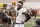 Missouri quarterback Kelly Bryant talks with teammates on the bench during an NCAA college football intra-squad spring game Saturday, April 13, 2019, in Columbia, Mo. (AP Photo/L.G. Patterson)