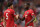 Manchester United's English defender Harry Maguire (L) shakes hands with Manchester United's French midfielder Paul Pogba (R) on the pitch at the final whistle in the English Premier League football match between Manchester United and Chelsea at Old Trafford in Manchester, north west England, on August 11, 2019. - Manchester United won the game 4-0. (Photo by Oli SCARFF / AFP) / RESTRICTED TO EDITORIAL USE. No use with unauthorized audio, video, data, fixture lists, club/league logos or 'live' services. Online in-match use limited to 120 images. An additional 40 images may be used in extra time. No video emulation. Social media in-match use limited to 120 images. An additional 40 images may be used in extra time. No use in betting publications, games or single club/league/player publications. /         (Photo credit should read OLI SCARFF/AFP/Getty Images)