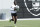Oakland Raiders wide receiver Antonio Brown warms up during an official team activity at the NFL football team's headquarters in Alameda, Calif., Tuesday, May 28, 2019. (AP Photo/Jeff Chiu)