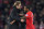 Liverpool's German manager Jurgen Klopp (L) celebrates on the pitch with goalscorer Liverpool's Dutch midfielder Georginio Wijnaldum after the English Premier League football match between Liverpool and Manchester City at Anfield in Liverpool, north west England on December 31, 2016.
Liverpool won the game 1-0. / AFP / Paul ELLIS / RESTRICTED TO EDITORIAL USE. No use with unauthorized audio, video, data, fixture lists, club/league logos or 'live' services. Online in-match use limited to 75 images, no video emulation. No use in betting, games or single club/league/player publications.  /         (Photo credit should read PAUL ELLIS/AFP/Getty Images)