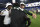 Baltimore Ravens quarterback Robert Griffin III, left, and quarterback Lamar Jackson, center, talk to Green Bay Packers quarterback Aaron Rodgers after an NFL football preseason game, Thursday, Aug. 15, 2019, in Baltimore. The Ravens won 26-13. (AP Photo/Nick Wass)
