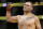 Cain Velasquez celebrates after defeating Travis Browne during their heavyweight mixed martial arts bout at UFC 200, Saturday, July 9, 2016, in Las Vegas. (AP Photo/John Locher)