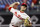 FILE - In this April 5, 2019, file photo, Philadelphia Phillies' David Robertson prepares to throw during a baseball game against the Minnesota Twins in Philadelphia. Robertson was told by Dr. James Andrews not to throw for three weeks to allow the flexor strain in his right elbow time to heal. He has not pitched since April 14. (AP Photo/Matt Slocum, File)