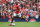 Manchester United's defender Aaron Wan-Bissaka runs with the ball on his premier league debut during the English Premier League football match between Manchester United and Chelsea at Old Trafford in Manchester, north west England, on August 11, 2019. (Photo by Oli SCARFF / AFP) / RESTRICTED TO EDITORIAL USE. No use with unauthorized audio, video, data, fixture lists, club/league logos or 'live' services. Online in-match use limited to 120 images. An additional 40 images may be used in extra time. No video emulation. Social media in-match use limited to 120 images. An additional 40 images may be used in extra time. No use in betting publications, games or single club/league/player publications. /         (Photo credit should read OLI SCARFF/AFP/Getty Images)