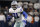 Dallas Cowboys running back Ezekiel Elliott (21) runs the ball against the Seattle Seahawks during an NFC wild-card NFL football game in Arlington, Texas, Saturday, Jan. 5, 2019.(AP Photo/Ron Jenkins)