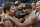 FILE - This May 2, 2015 file photo shows Manny Pacquiao from the Philippines, left, and Floyd Mayweather Jr., embracing in the ring at the finish of their welterweight title fight in Las Vegas. A federal judge Friday, Aug. 25, 2017 dismissed class-action lawsuits by disgruntled boxing fans around the country who complained they didn't get their pay-per-view money's worth in the fight. The judge said that he felt sympathy for fans who felt deceived that Pacquiao's camp failed to disclose he had a shoulder injury until about three hours before the fight. (AP Photo/Isaac Brekken,File)
