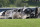 The burned remains of a plane that was carrying NASCAR television analyst and former driver Dale Earnhardt Jr. lies near a runway Thursday, Aug. 15, 2019, in Elizabethton, Tenn. Officials said the Cessna Citation rolled off the end of a runway and caught fire after landing at Elizabethton Municipal Airport. Earnhardt's sister, Kelley Earnhardt Miller, tweeted that