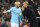 Manchester City's Spanish midfielder David Silva talks with Manchester City's Spanish manager Pep Guardiola after having his head bandaged during the UEFA Champions League Group F football match between Manchester City and Napoli at the Etihad Stadium in Manchester, north west England, on October 17, 2017. / AFP PHOTO / Oli SCARFF        (Photo credit should read OLI SCARFF/AFP/Getty Images)