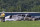 The burned remains of a plane that was carrying NASCAR television analyst and former driver Dale Earnhardt Jr. lies near a runway Thursday, Aug. 15, 2019, in Elizabethton, Tenn. Officials said the Cessna Citation rolled off the end of a runway and caught fire after landing at Elizabethton Municipal Airport. Earnhardt's sister, Kelley Earnhardt Miller, tweeted that