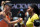 Serena Williams of the US (R) shakes hands with Russia's Maria Sharapova after winning their women's singles match on day nine of the 2016 Australian Open tennis tournament in Melbourne on January 26, 2016. AFP PHOTO / SAEED KHAN --  IMAGE RESTRICTED TO EDITORIAL USE - STRICTLY NO COMMERCIAL USE / AFP / SAEED KHAN        (Photo credit should read SAEED KHAN/AFP/Getty Images)