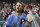 Philadelphia Phillies' Bryce Harper reacts to his grand slam following the ninth inning of a baseball game against the Chicago Cubs, Thursday, Aug. 15, 2019, in Philadelphia. The Phillies won 7-5. (AP Photo/Chris Szagola)