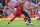 LIVERPOOL, ENGLAND - AUGUST 24: Fabinho of Liverpool tackles Joe Willock of Arsenal during the Premier League match between Liverpool FC and Arsenal FC at Anfield on August 24, 2019 in Liverpool, United Kingdom. (Photo by Laurence Griffiths/Getty Images)