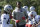 New England Patriots wide receiver Demaryius Thomas, center, warms up with teammates during an NFL football training camp practice, Thursday, July 25, 2019, in Foxborough, Mass. (AP Photo/Steven Senne)