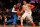 NEW YORK, NY - DECEMBER 16:  (NEW YORK DAILIES OUT)    Carmelo Anthony #7 of the Oklahoma City Thunder in action against Enes Kanter #00 of the New York Knicks at Madison Square Garden on December 16, 2017 in New York City. The Knicks defeated the Thunder 111-96. NOTE TO USER: User expressly acknowledges and agrees that, by downloading and/or using this Photograph, user is consenting to the terms and conditions of the Getty Images License Agreement.  (Photo by Jim McIsaac/Getty Images)
