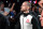 CM Punk walks to the octagon before a welterweight bout at UFC 203 on Saturday, Sept. 10, 2016, in Cleveland. (AP Photo/David Dermer)
