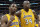 FILE - In this May 4, 2002, file photo, Los Angeles Lakers' Kobe Bryant, left, and Shaquille O'Neal celebrate after winning Game 5 of the Western Conference semifinals against the San Antonio Spurs, in Los Angeles. Bryant downplayed talk of a reignited feud with Shaquille O'Neal, saying there is