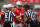 COLUMBUS, OH - AUGUST 31:  Justin Fields #1 of the Ohio State Buckeyes meets with officials before a game against the Florida Atlantic Owls at Ohio Stadium on August 31, 2019 in Columbus, Ohio.  (Photo by Jamie Sabau/Getty Images)
