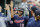 Minnesota Twins' Mitch Garver is greeted in the dugout after his solo home run during the first inning of a baseball game against the Detroit Tigers, Saturday, Aug. 31, 2019, in Detroit. (AP Photo/Carlos Osorio)