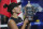 Bianca Andreescu, of Canada, kisses the championship trophy after defeating Serena Williams, of the United States, in the women's singles final of the U.S. Open tennis championships Saturday, Sept. 7, 2019, in New York. (AP Photo/Charles Krupa)