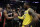 Miami Heat guard Dwyane Wade, left, shakes hands with Los Angeles Lakers' LeBron James at the end of an NBA basketball game Monday, Dec. 10, 2018, in Los Angeles. (AP Photo/Marcio Jose Sanchez)