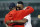 Former Boston Red Sox's David Ortiz, right, hugs former teammate Jason Varitek after throwing out a ceremonial first pitch before a baseball game against the New York Yankees in Boston, Monday, Sept. 9, 2019. (AP Photo/Michael Dwyer)