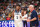 DONGGUAN, CHINA - SEPTEMBER 11: Donovan Mitchell #5, and Head Coach Gregg Popovich of USA talk against France during the 2019 FIBA World Cup Quarter-Finals at the Dongguan Basketball Center on September 11, 2019 in Dongguan, China.  NOTE TO USER: User expressly acknowledges and agrees that, by downloading and/or using this Photograph, user is consenting to the terms and conditions of the Getty Images License Agreement. Mandatory Copyright Notice: Copyright 2019 NBAE (Photo by David Dow/NBAE via Getty Images)