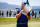 STATELINE, NEVADA - JULY 14: Tony Romo hugs the winner's trophy after winning the American Century Championship at Edgewood Tahoe Golf Course on July 14, 2019 in Stateline, Nevada. (Photo by Jonathan Devich/Getty Images)