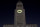 Fans gather as a Bat-Signal is projected onto City Hall during a tribute to