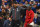 Liverpool's German manager Jurgen Klopp (L) gestures to Liverpool's Senegalese striker Sadio Mane (R) on the pitch after the English Premier League football match between Chelsea and Liverpool at Stamford Bridge in London on September 22, 2019. - Liverpool won the game 2-1. (Photo by OLLY GREENWOOD / AFP) / RESTRICTED TO EDITORIAL USE. No use with unauthorized audio, video, data, fixture lists, club/league logos or 'live' services. Online in-match use limited to 120 images. An additional 40 images may be used in extra time. No video emulation. Social media in-match use limited to 120 images. An additional 40 images may be used in extra time. No use in betting publications, games or single club/league/player publications. /         (Photo credit should read OLLY GREENWOOD/AFP/Getty Images)