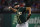 FILE - In this Sept. 14, 2019, file photo, Oakland Athletics relief pitcher Lou Trivino works against the Texas Rangers during a baseball game in Arlington, Texas.  Trivino will miss the rest of the regular season and likely the playoffs after cracking a rib falling in the shower. Manager Bob Melvin said Tuesday, Sept. 24, he did not expect Trivino to be available in the postseason should the A’s secure a spot after the 27-year-old right-hander was injured in his Bay Area apartment last week. “We’re saying, for sure, the regular season,” Melvin said. “He’s going to get a second opinion, I think, at some point in time here, but it doesn’t look great, unfortunately.” (AP Photo/Tony Gutierrez, File)
