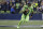 Seattle Seahawks quarterback Russell Wilson scrambles against the Los Angeles Rams during the first half of an NFL football game, Thursday, Oct. 3, 2019, in Seattle. (AP Photo/Elaine Thompson)