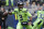 Seattle Seahawks quarterback Russell Wilson drops back to pass against the Los Angeles Rams during the first half of an NFL football game Thursday, Oct. 3, 2019, in Seattle. (AP Photo/Elaine Thompson)