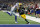 Green Bay Packers' Aaron Jones (33) reaches the end zone for a touchdown in front of Dallas Cowboys' Byron Jones during the second half of an NFL football game in Arlington, Texas, Sunday, Oct. 6, 2019. (AP Photo/Michael Ainsworth)