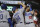 Los Angeles Dodgers third baseman Justin Turner (10) celebrates his three-run home run off Washington Nationals relief pitcher Wander Suero with teammates Enrique Hernandez (14) and Max Muncy (13) during the sixth inning in Game 3 of a baseball National League Division Series on Sunday, Oct. 6, 2019, in Washington. (AP Photo/Julio Cortez)
