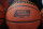 A basketball with a logo is seen before a first round men's college basketball game between Minnesota and Louisville in the NCAA Tournament, Thursday, March 21, 2019, in Des Moines, Iowa. (AP Photo/Charlie Neibergall)