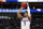Kansas guard Quentin Grimes (5) shoots against Northeastern during a first round men's college basketball game in the NCAA Tournament Thursday, March 21, 2019, in Salt Lake City. (AP Photo/Jeff Swinger)