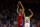 PHILADELPHIA, PA - OCTOBER 08: Ben Simmons #25 of the Philadelphia 76ers shoots a three point shot CJ Harris #22 of the Guangzhou Long Lions during the preseason game at the Wells Fargo Center on October 8, 2019 in Philadelphia, Pennsylvania. NOTE TO USER: User expressly acknowledges and agrees that, by downloading and or using this photograph, User is consenting to the terms and conditions of the Getty Images License Agreement. (Photo by Mitchell Leff/Getty Images)