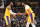 LOS ANGELES, CA - OCTOBER 29: LeBron James #23 and Anthony Davis #3 of the Los Angeles Lakers shake hands against the Memphis Grizzlies on October 29, 2019 at STAPLES Center in Los Angeles, California. NOTE TO USER: User expressly acknowledges and agrees that, by downloading and/or using this Photograph, user is consenting to the terms and conditions of the Getty Images License Agreement. Mandatory Copyright Notice: Copyright 2019 NBAE (Photo by Andrew D. Bernstein/NBAE via Getty Images)