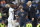 Real Madrid's Brazilian forward Vinicius Junior (L) shakes hands with Real Madrid's French coach Zinedine Zidane as he leaves the pitch during the Spanish league football match between Real Madrid CF and CA Osasuna at the Santiago Bernabeu stadium in Madrid, on September 25, 2019. (Photo by OSCAR DEL POZO / AFP)        (Photo credit should read OSCAR DEL POZO/AFP/Getty Images)